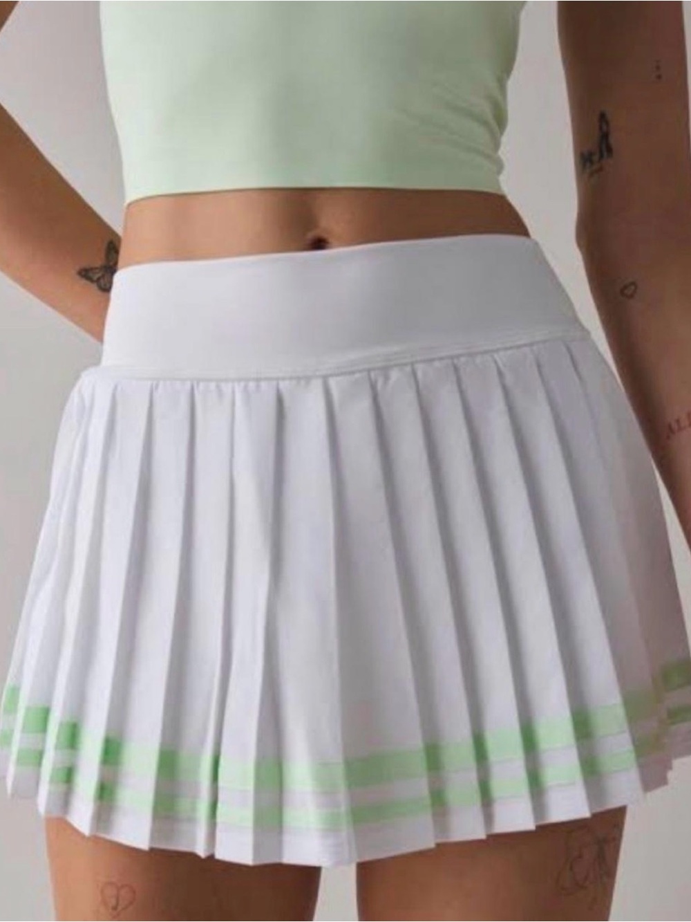 New Balance White Pleated Mini Skirt with Mint Green Stripe